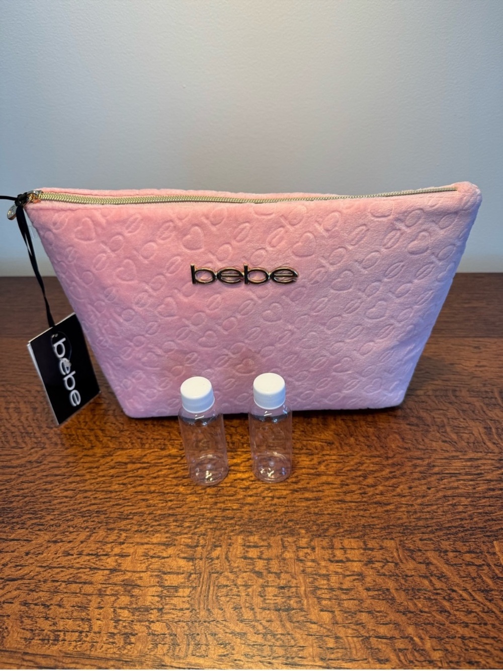 bebe Pink Quilted Heart-Embossed Cosmetic Bag with Travel Bottles
